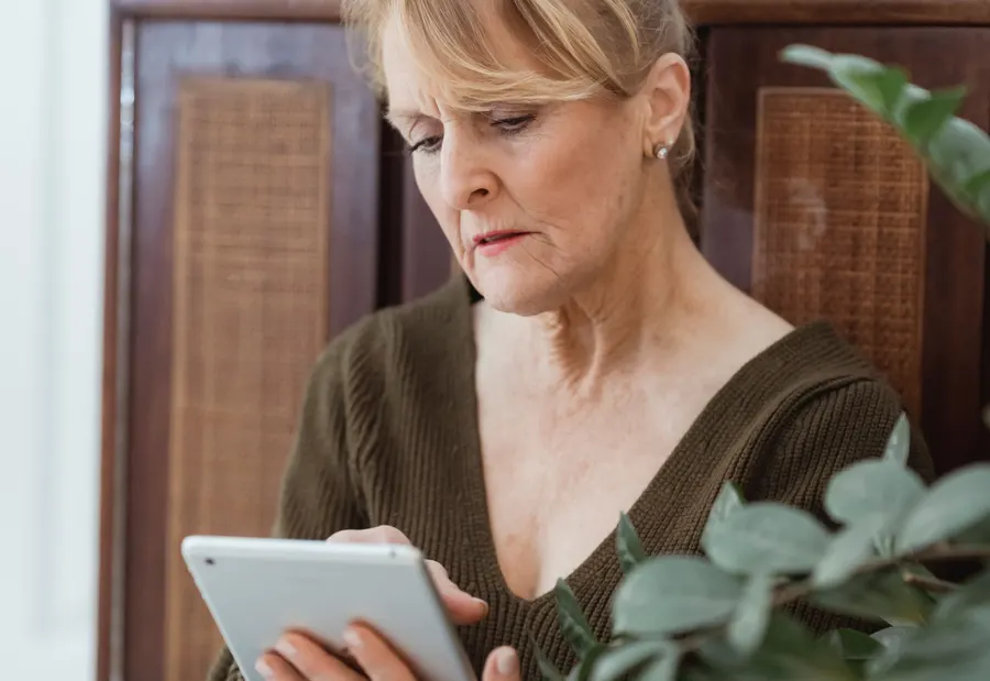 Adult using a tablet in an everyday setting